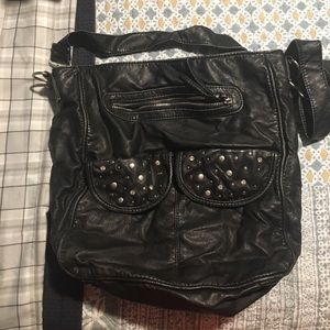 Black Maurices crossbody purse with stud detail.